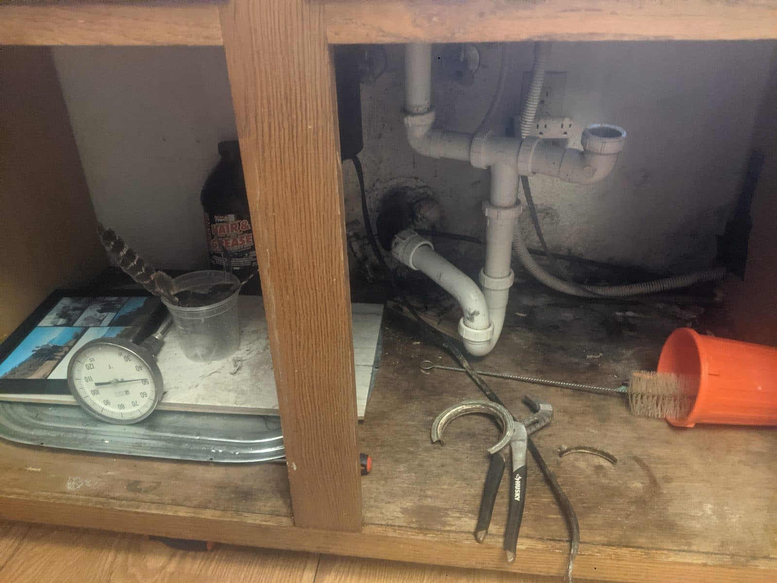Under-Sink Repair — Before